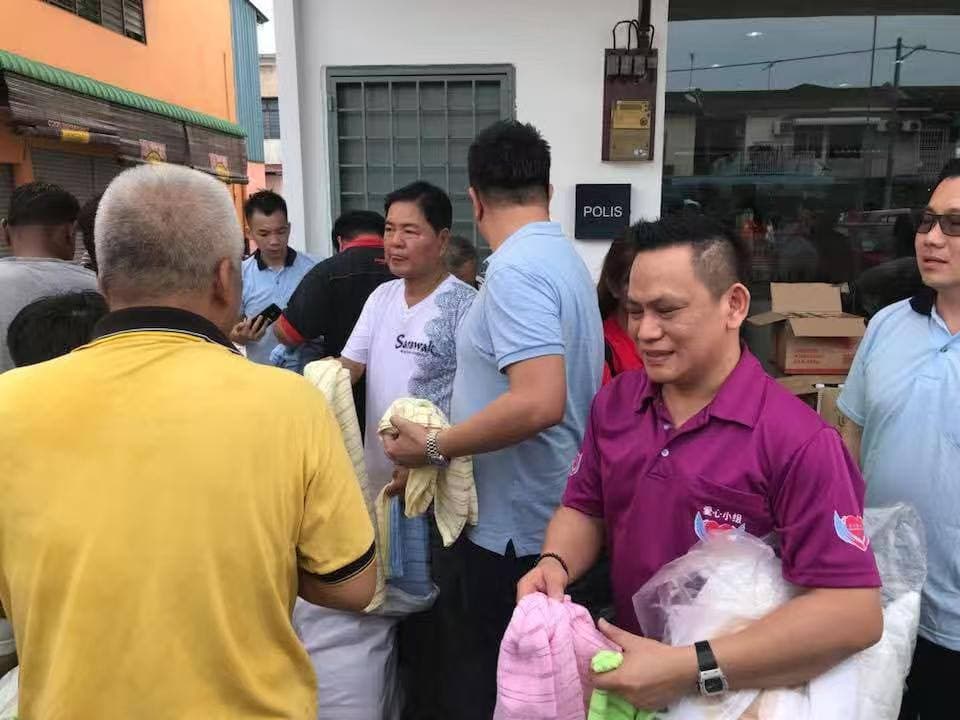 Datuk Fam Chee Way at community welfare and donation program Malaysia